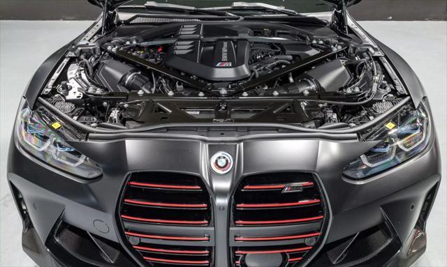 used 2022 BMW M4 car, priced at $79,900