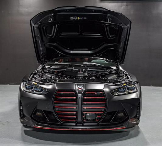 used 2022 BMW M4 car, priced at $79,900