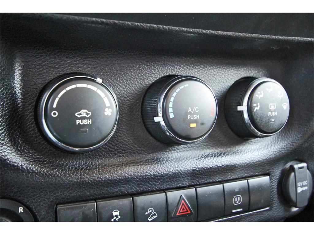 used 2015 Jeep Wrangler Unlimited car, priced at $19,329