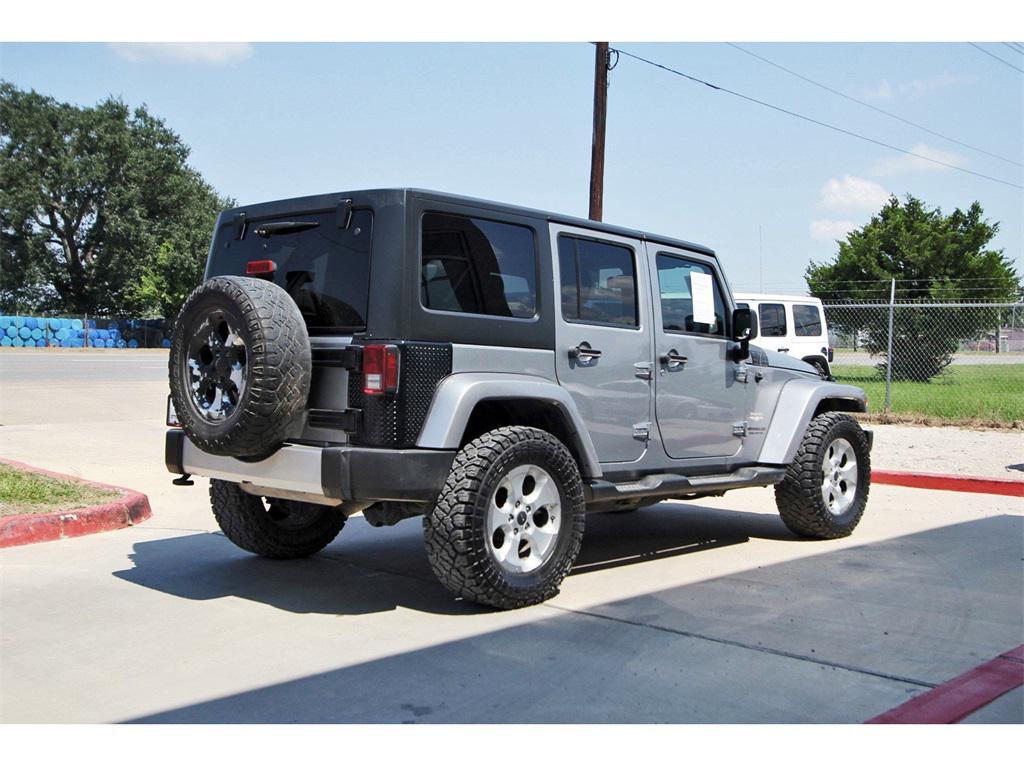 used 2015 Jeep Wrangler Unlimited car, priced at $19,329