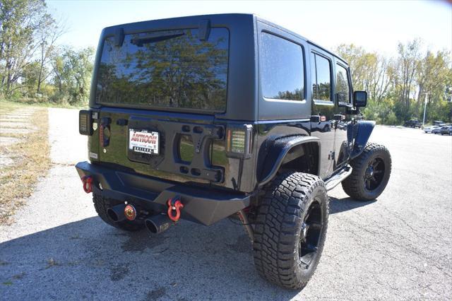 used 2018 Jeep Wrangler JK Unlimited car, priced at $34,946