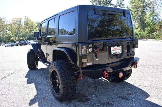 used 2018 Jeep Wrangler JK Unlimited car, priced at $34,946