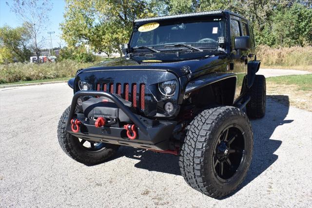 used 2018 Jeep Wrangler JK Unlimited car, priced at $34,946