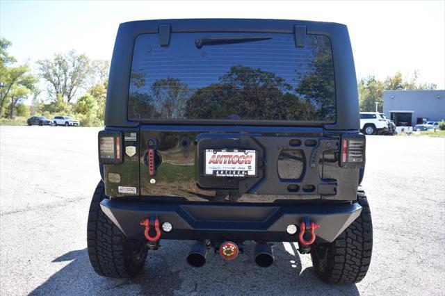 used 2018 Jeep Wrangler JK Unlimited car, priced at $34,946