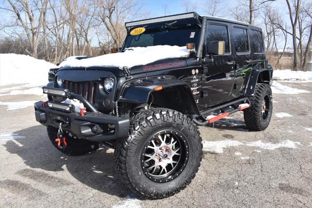 used 2016 Jeep Wrangler Unlimited car, priced at $31,946