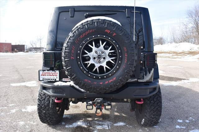 used 2016 Jeep Wrangler Unlimited car, priced at $31,946