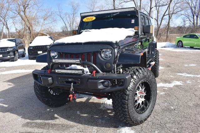 used 2016 Jeep Wrangler Unlimited car, priced at $31,946