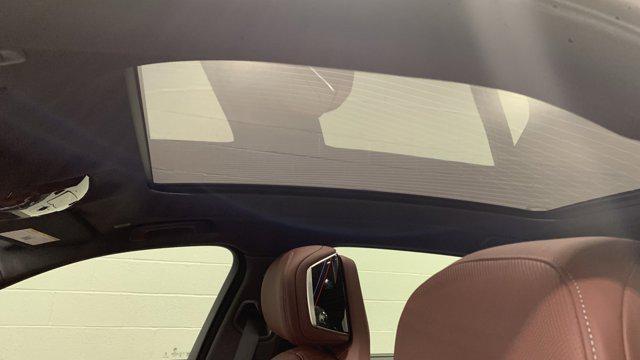 new 2025 BMW 740 car, priced at $104,755