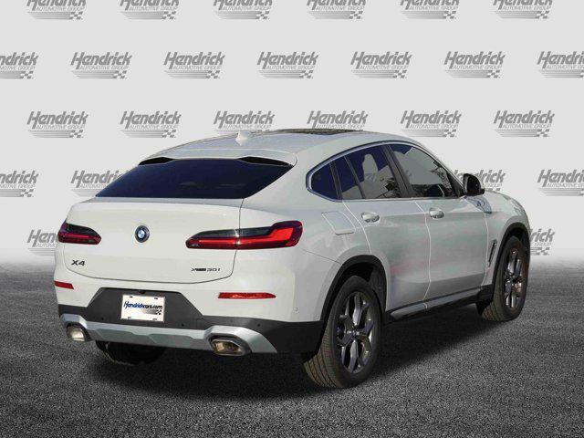 used 2025 BMW X4 car, priced at $54,989