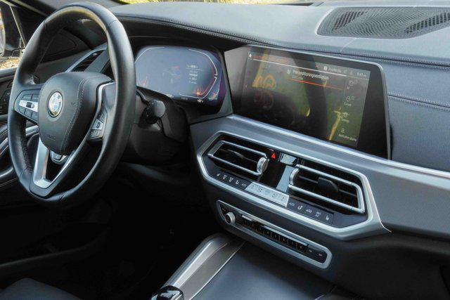 used 2023 BMW X6 car, priced at $48,911