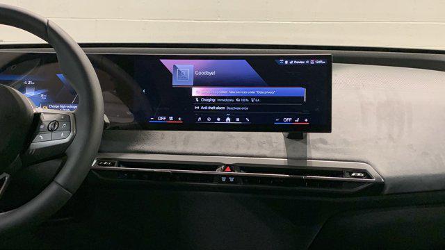 new 2026 BMW iX car, priced at $102,875