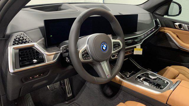 new 2025 BMW X5 PHEV car, priced at $83,375