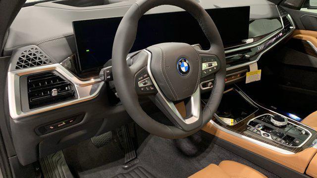 new 2026 BMW X5 PHEV car, priced at $83,875
