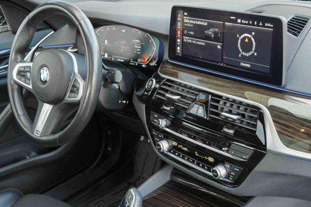 used 2023 BMW 530 car, priced at $39,319