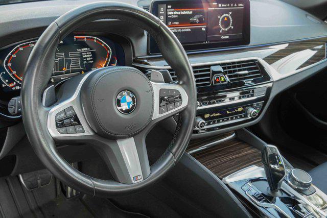 used 2023 BMW 530 car, priced at $39,319