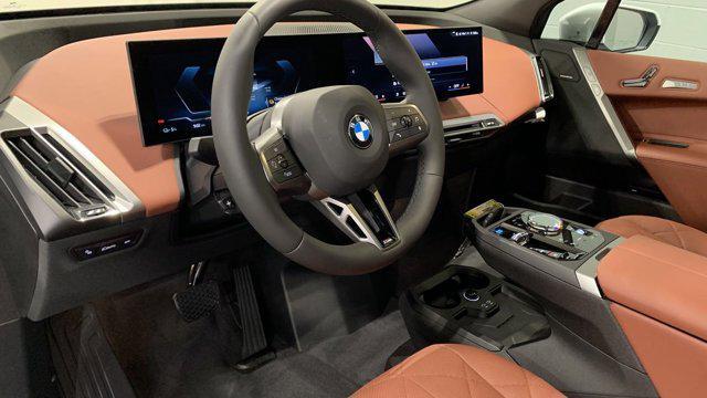 new 2025 BMW iX car, priced at $104,595