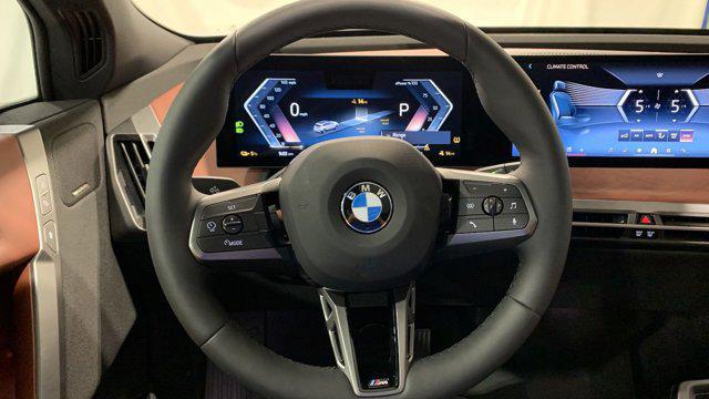 new 2025 BMW iX car, priced at $104,595