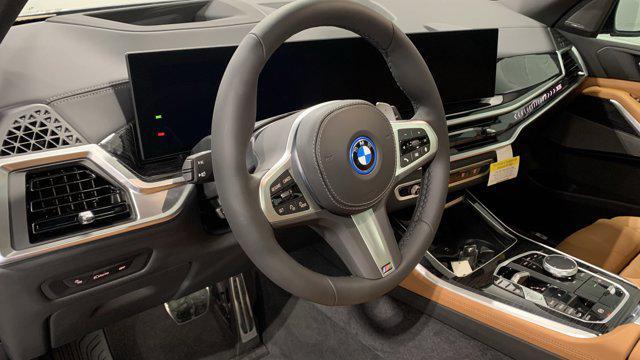 new 2026 BMW X5 PHEV car, priced at $84,650