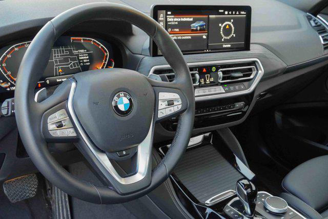 used 2025 BMW X4 car, priced at $47,988