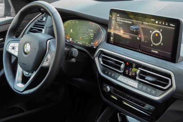 used 2025 BMW X4 car, priced at $47,988