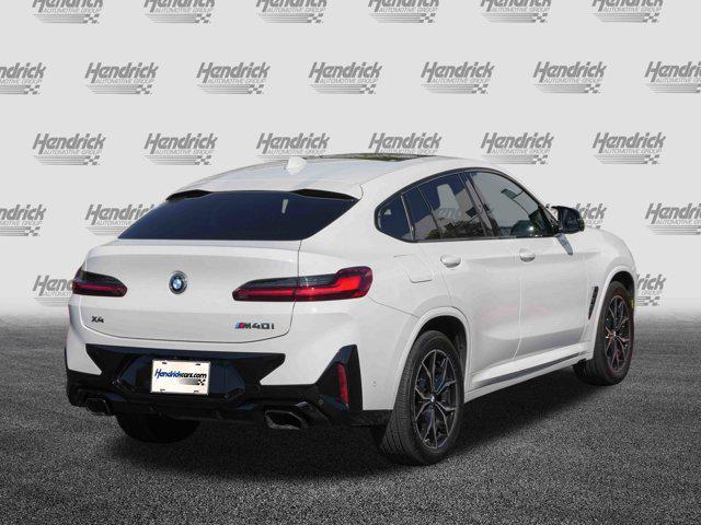 used 2025 BMW X4 car, priced at $60,675
