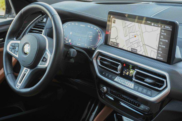 used 2025 BMW X4 car, priced at $60,675