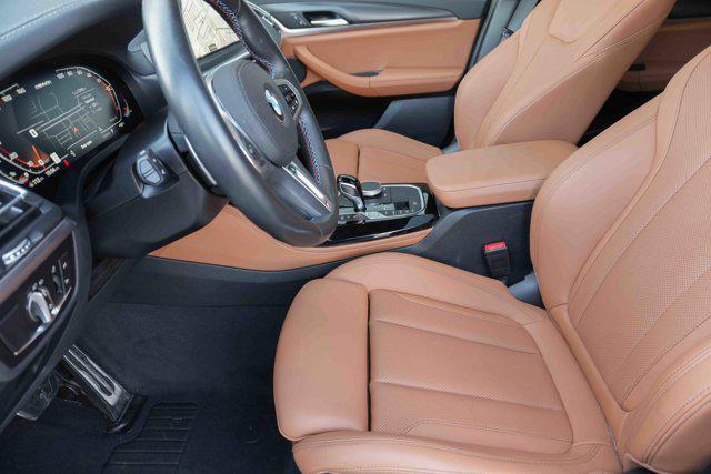 used 2025 BMW X4 car, priced at $60,675