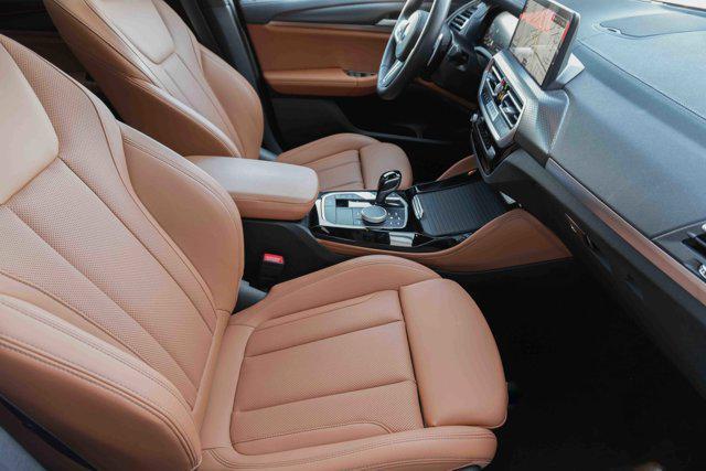 used 2025 BMW X4 car, priced at $60,675