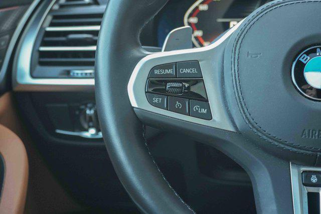 used 2025 BMW X4 car, priced at $60,675