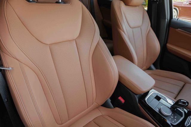 used 2025 BMW X4 car, priced at $60,675