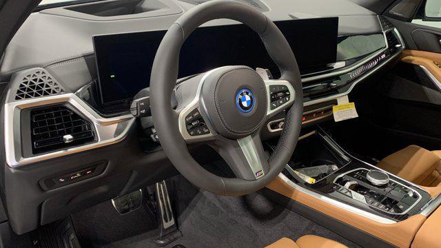 new 2026 BMW X5 PHEV car, priced at $83,400