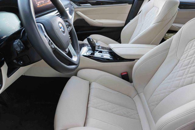 used 2023 BMW 530e car, priced at $37,319