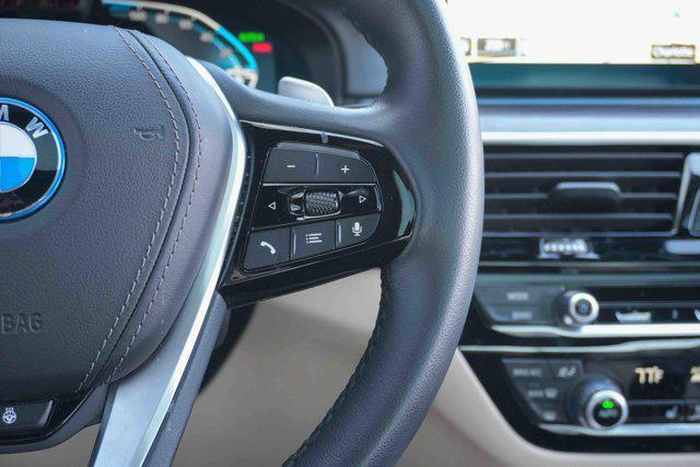used 2023 BMW 530e car, priced at $37,319