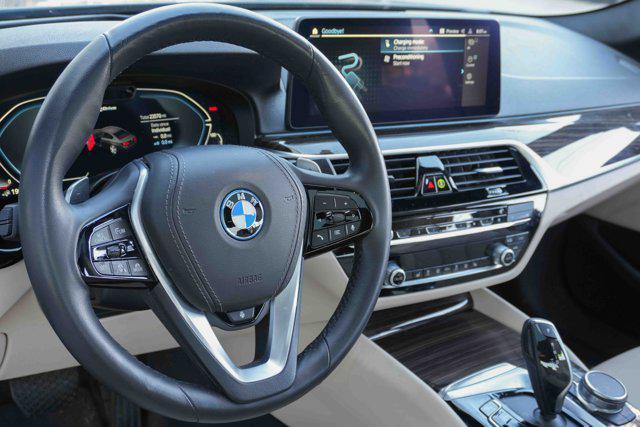 used 2023 BMW 530e car, priced at $37,319