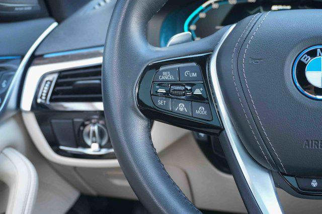 used 2023 BMW 530e car, priced at $37,319