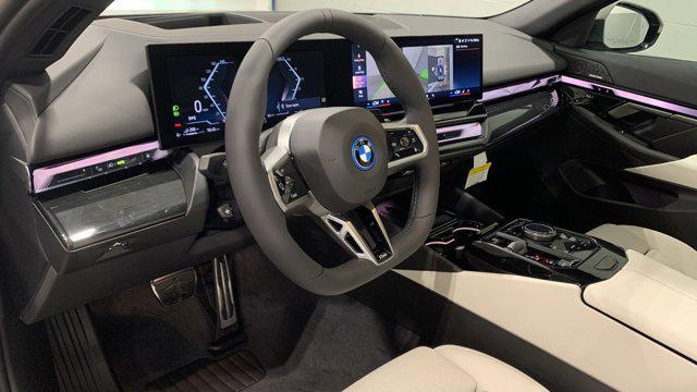 new 2025 BMW 550e car, priced at $82,755