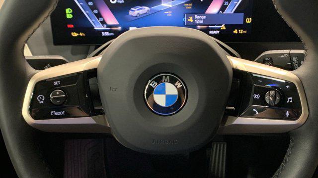 new 2026 BMW iX car, priced at $84,445
