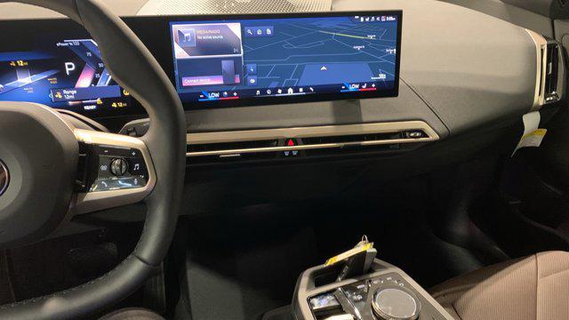 new 2026 BMW iX car, priced at $84,445