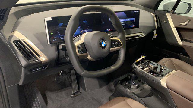 new 2026 BMW iX car, priced at $84,445