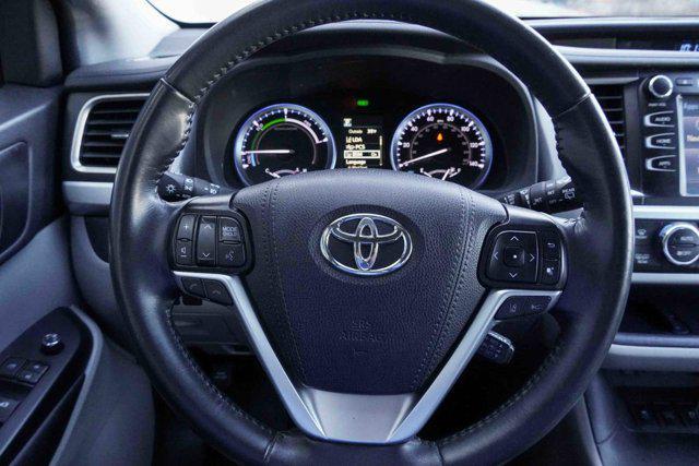 used 2019 Toyota Highlander Hybrid car, priced at $27,879