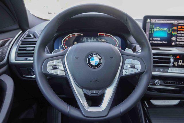 used 2025 BMW X4 car, priced at $55,991