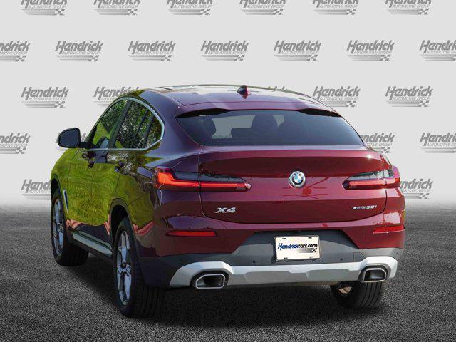 used 2025 BMW X4 car, priced at $55,991