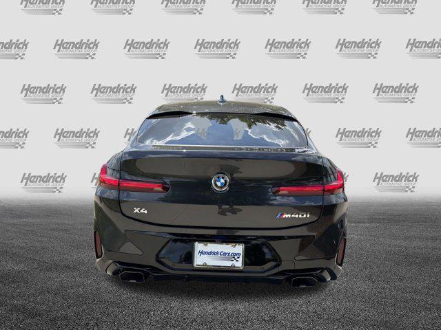 used 2025 BMW X4 car, priced at $58,991