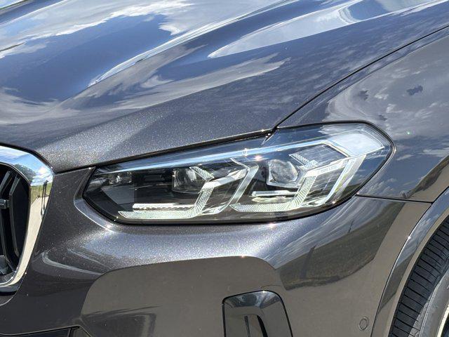 used 2025 BMW X4 car, priced at $58,991