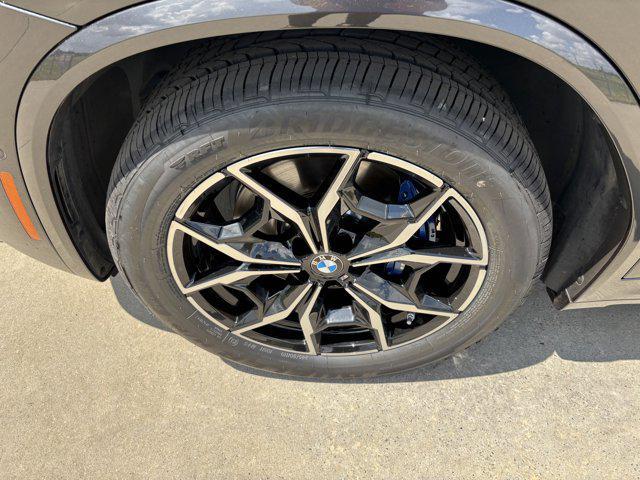 used 2025 BMW X4 car, priced at $58,991