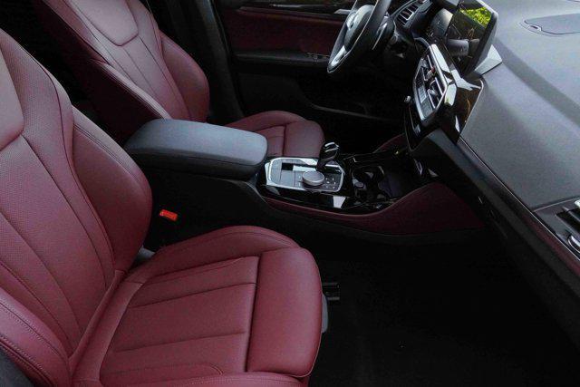 used 2025 BMW X4 car, priced at $56,991