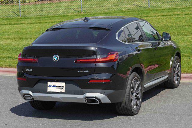 used 2025 BMW X4 car, priced at $56,991