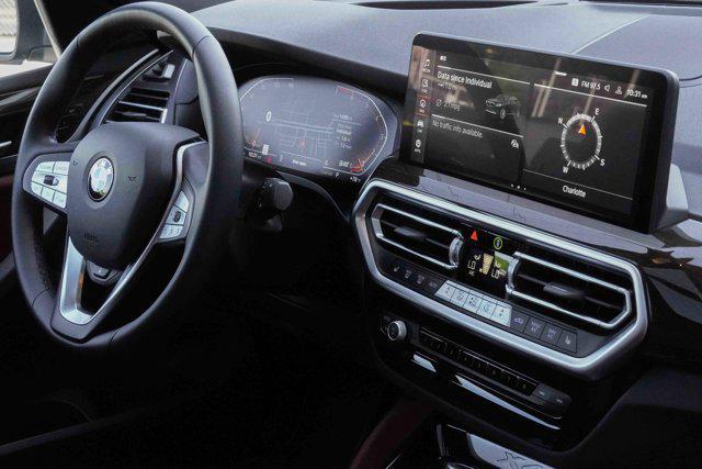 used 2025 BMW X4 car, priced at $56,991