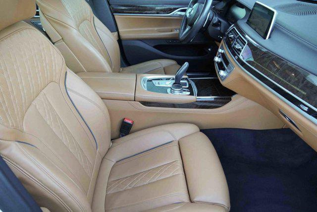 used 2022 BMW 750 car, priced at $56,374