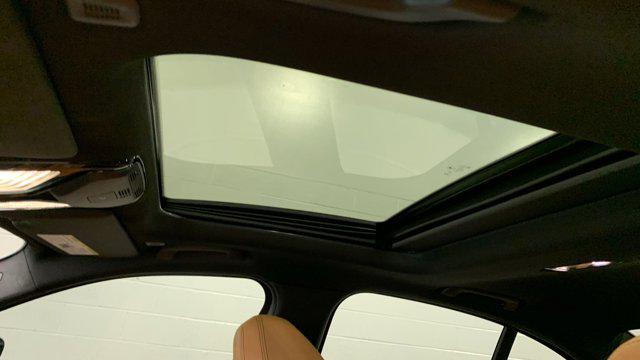 new 2025 BMW 330 car, priced at $55,880